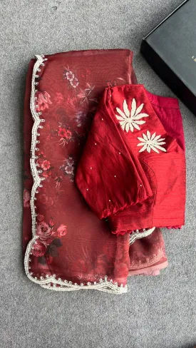 Maroon organza saree with pearl handwork blouse